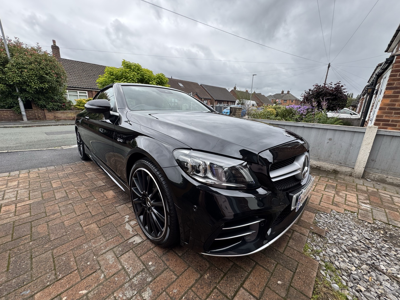 Freshly detailed Mercedes-AMG C43 parked on a driveway in Widnes